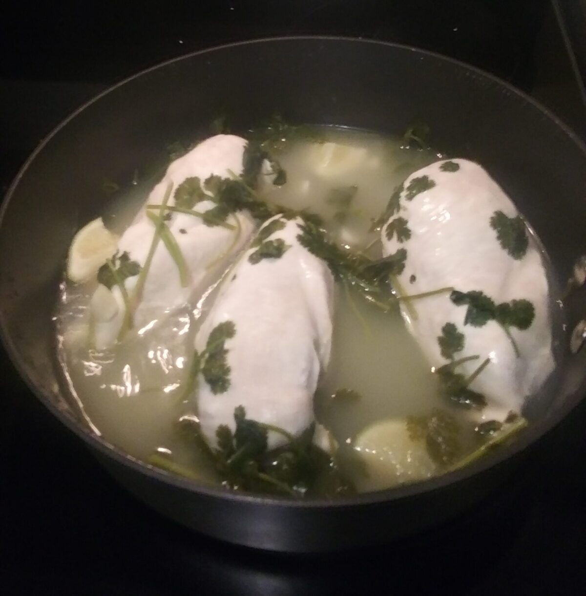 poached chicken in herbs